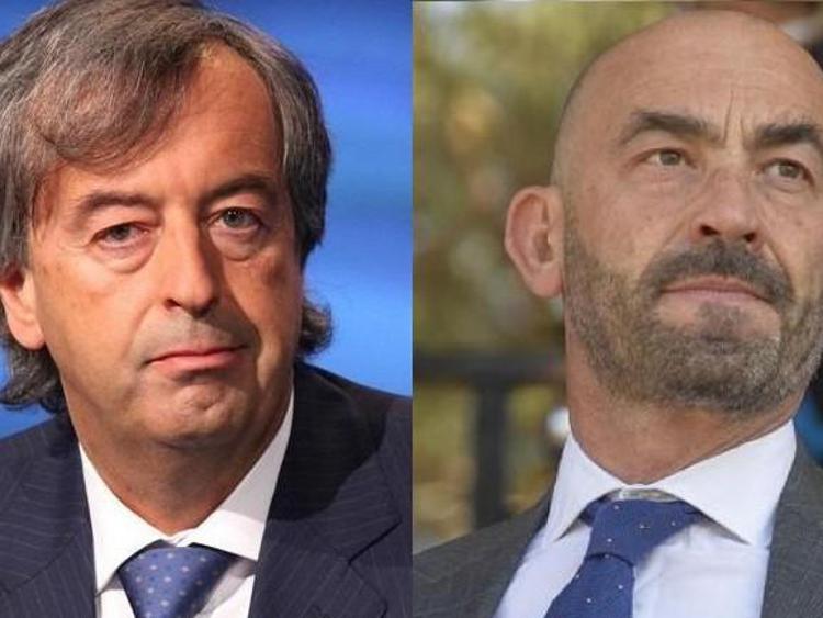 Roberto Burioni e Matteo Bassetti (Fotogramma)