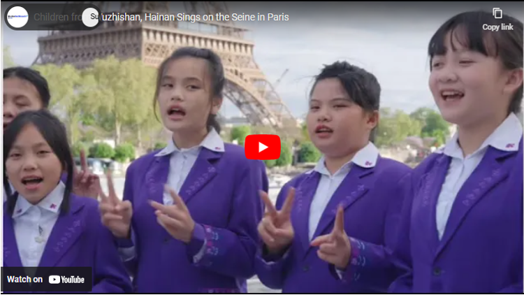 Children from Wuzhishan, Hainan Sings on the Seine in Paris during the opening performance of the Sino-French Gourmet Carnival