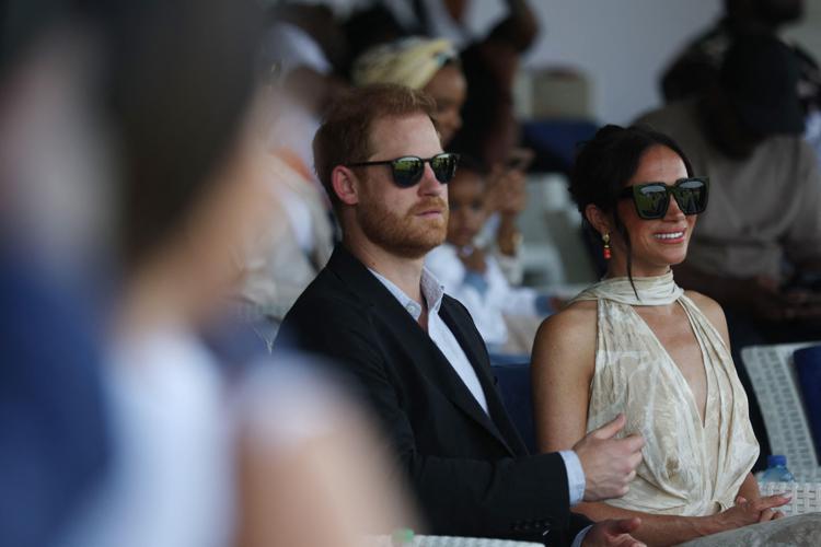 Il principe Harry e Meghan Markle<span id=