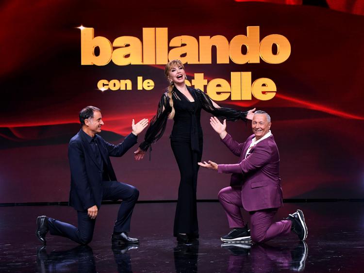 Il regista Luca Alcuni insieme a Milly Carlucci e Paolo Belli - Fotogramma