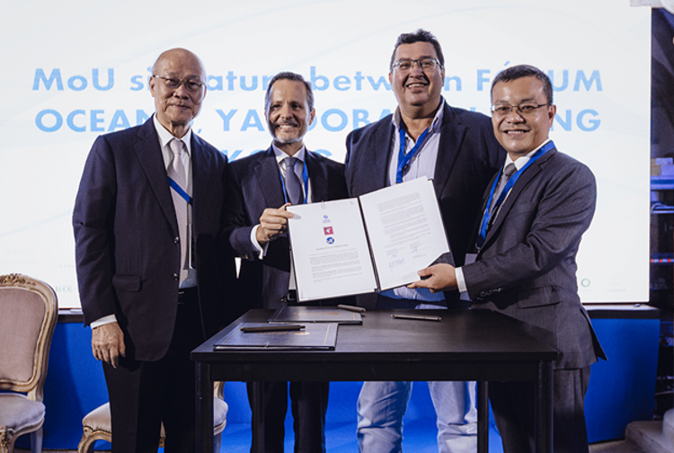 HKVAX, Fórum Oceano, and Yacooba Labs representatives sign MoU for Blue Economy STO project. From left to right: Dr. Ambrose So, President of the International Forum for Clean Energy (Macau), Carlos Costa Pina, President of Fórum Oceano, Mauricio Marques, Founder and CEO of Yacooba Labs, and Dr. Anthony Ng, Co-Founder and CEO of HKVAX