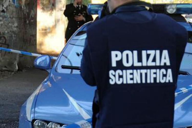 Rilievi della polizia scientifica - Fotogramma