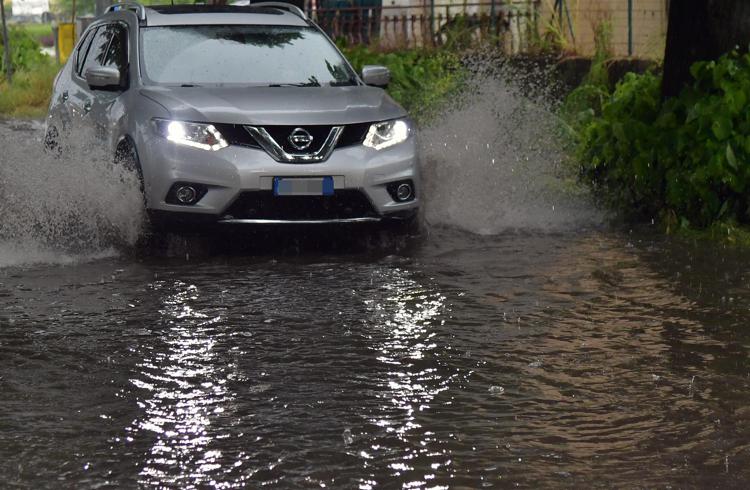 Strade piene d'acqua per il maltempo, immagine di repertorio (Fotogramma/Ipa)