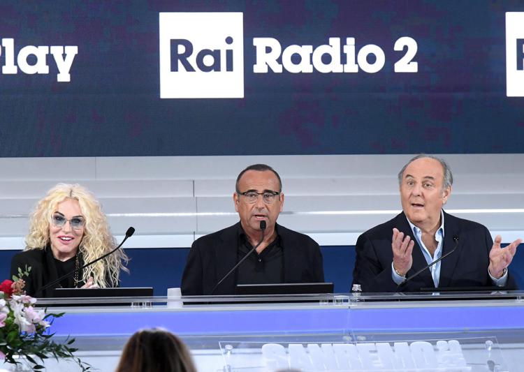 Antonella Clerici, Carlo Conti e Gerry Scotti (Fotogramma/Ipa)