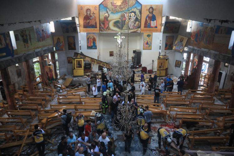 Strage in chiesa a Damasco (Afp)