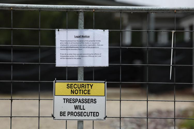 Cartello sul cancello di casa di Erin Patterson (Afp)